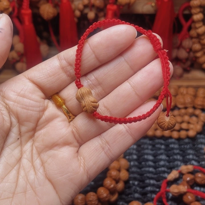 悦***️木质类龙纹桃枭挂件