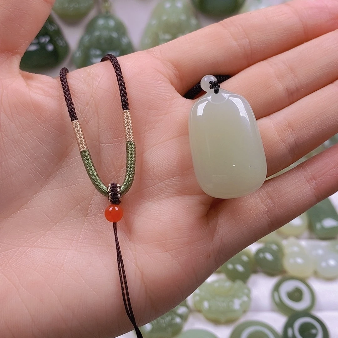 豫***记和田玉未镶嵌颈饰