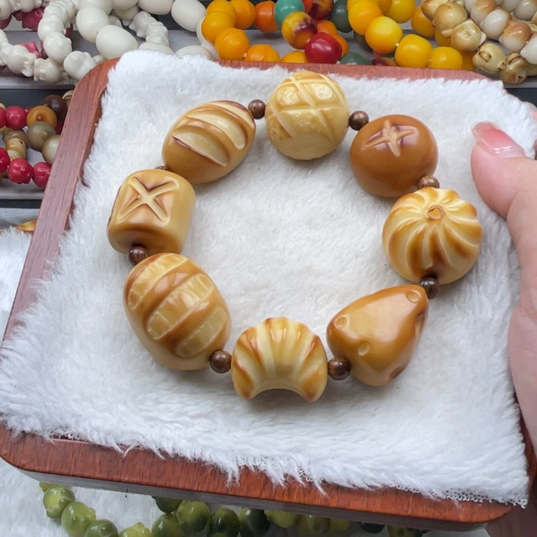 菩提根/象牙果吊坠小吃货牙果手持一串WC通货