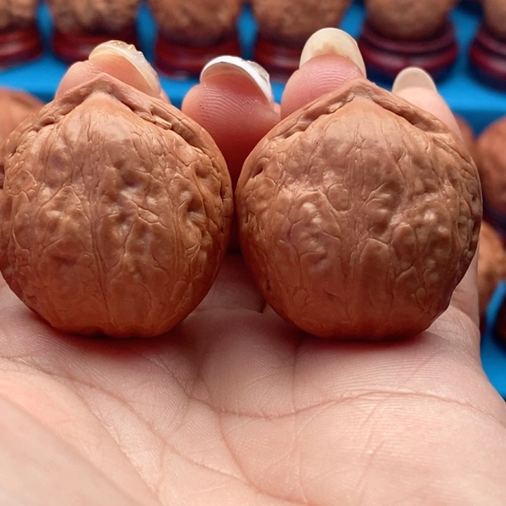 核桃精品文玩核桃手捻寿桃