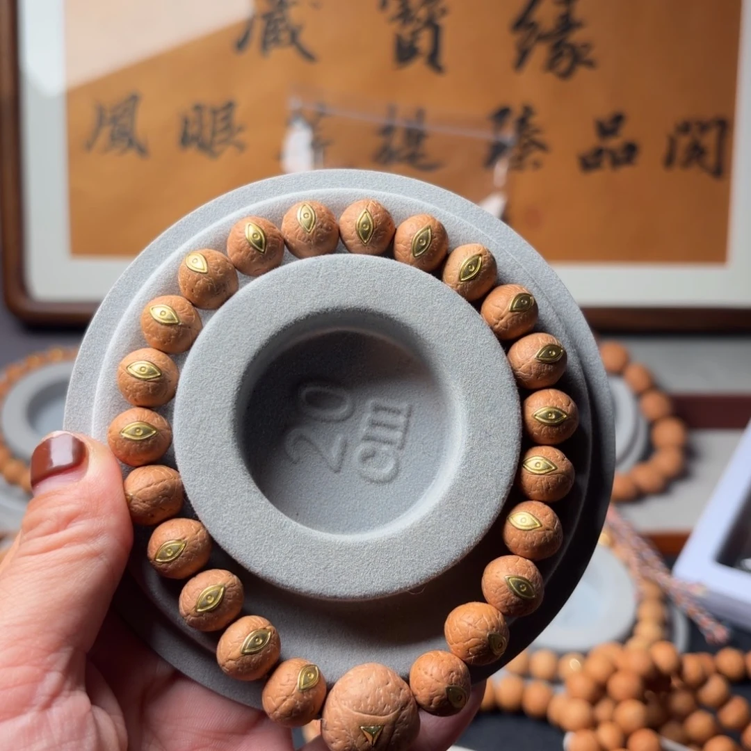 凤眼菩提手串镶嵌法螺眼
