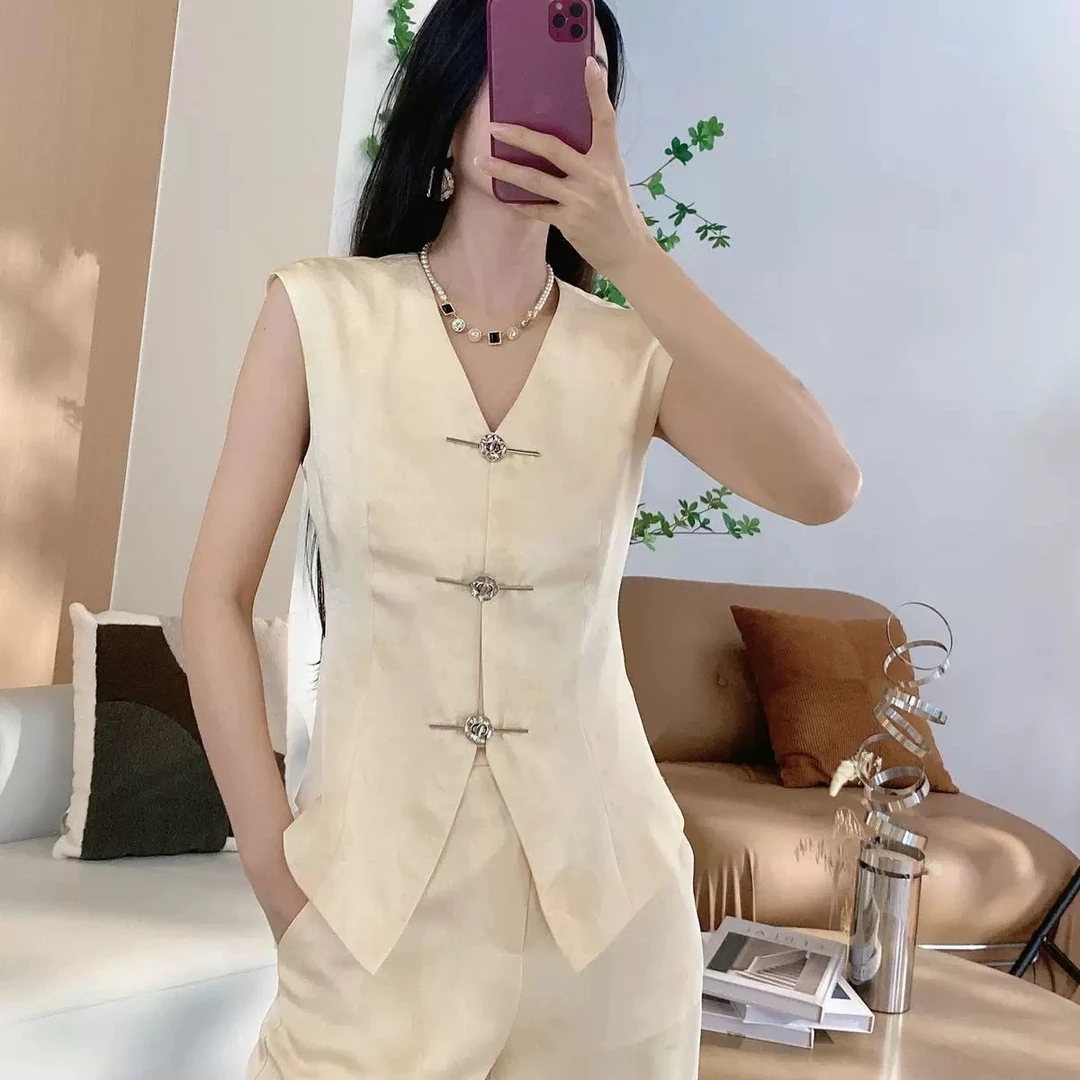 〈纪朵研〉1001坎肩袖国风蝴蝶提花上衣+两侧松紧阔腿裤两件套