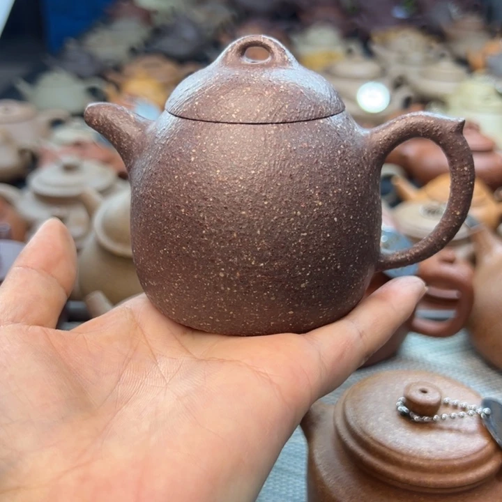 L***o茶壶紫砂紫砂壶的制作方法是将