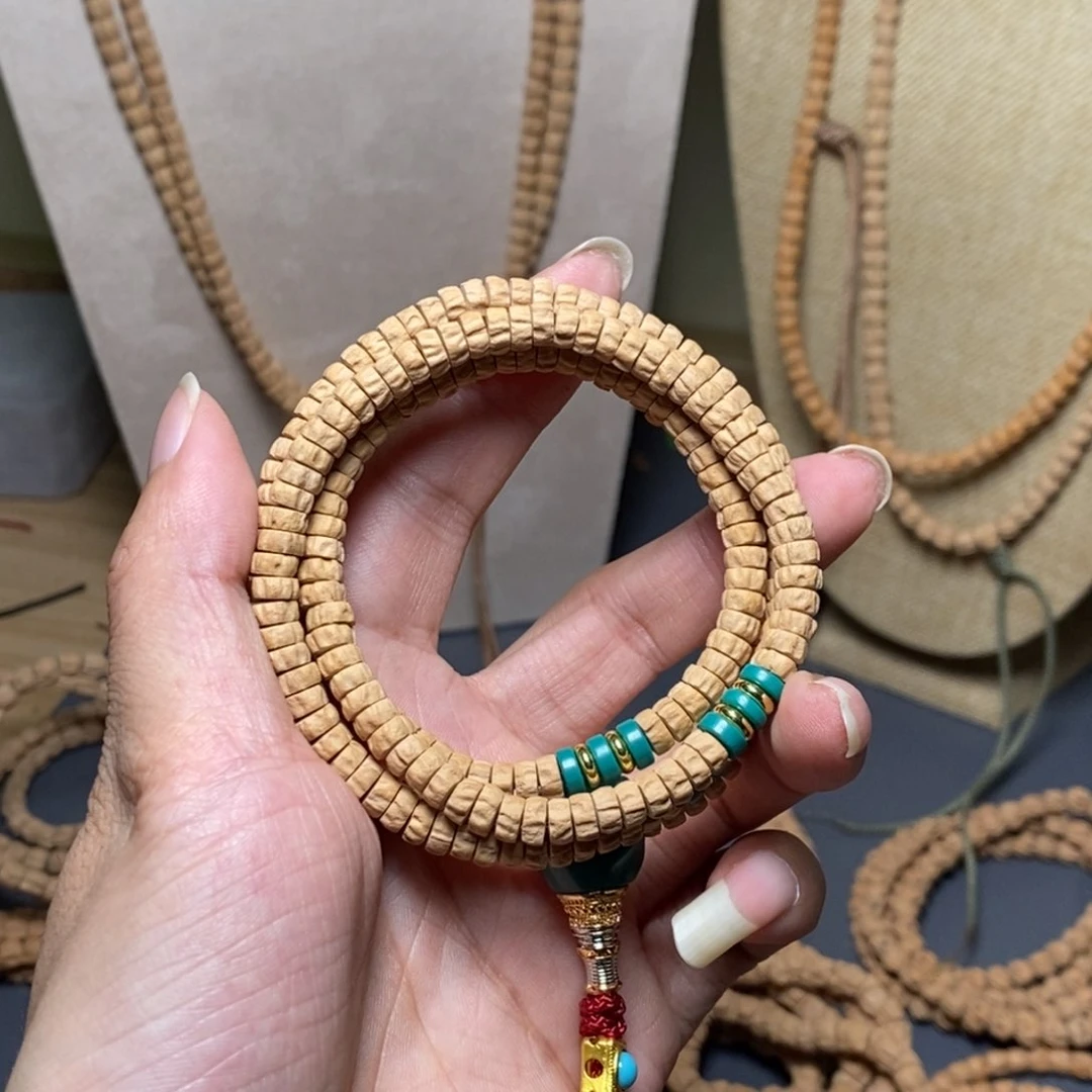 坦***克柏香籽/百香籽吊坠5.8-6顺纹药片