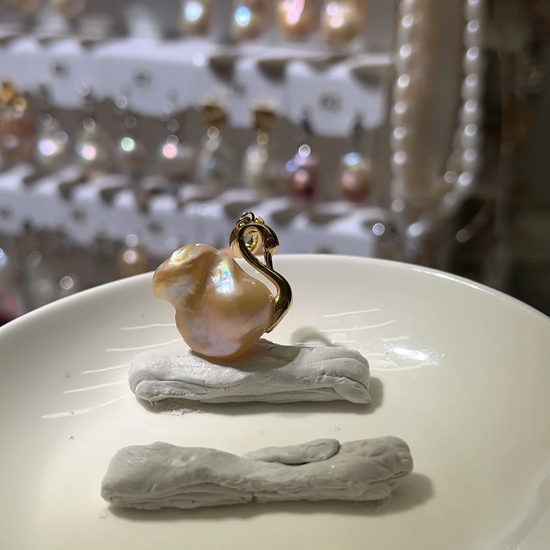 淡水珍珠银S925镶嵌耳饰