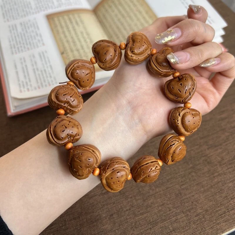 天然桃核奶酪加心手串油性实足规格大约22