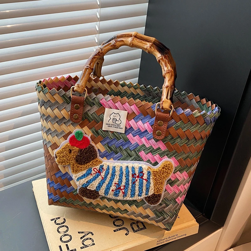 夏季海边度假草编包包女式2025新款网红腊肠狗手提包编织菜篮子包