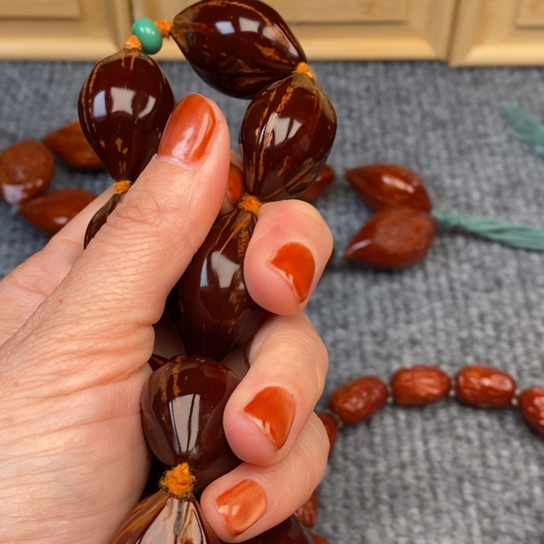 墨***麟橄榄核手串/手链四花铁素