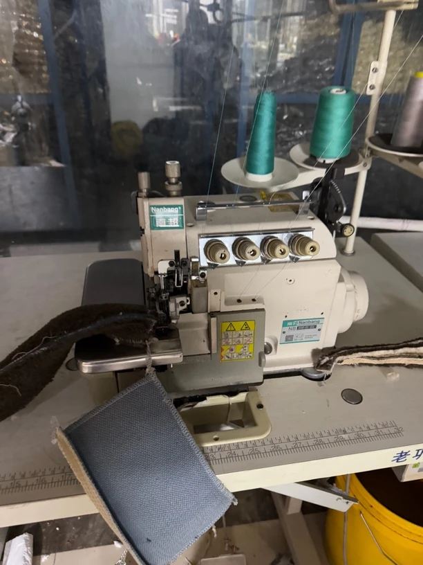 南邦同步四线锁边机