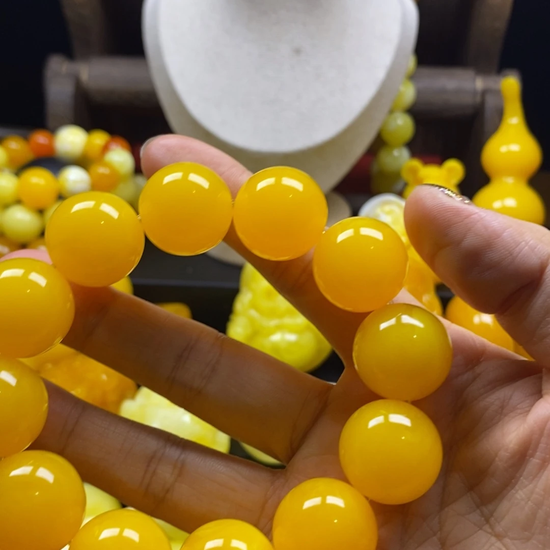 一***姐非金属全品无暇鸡油黄20精品手串