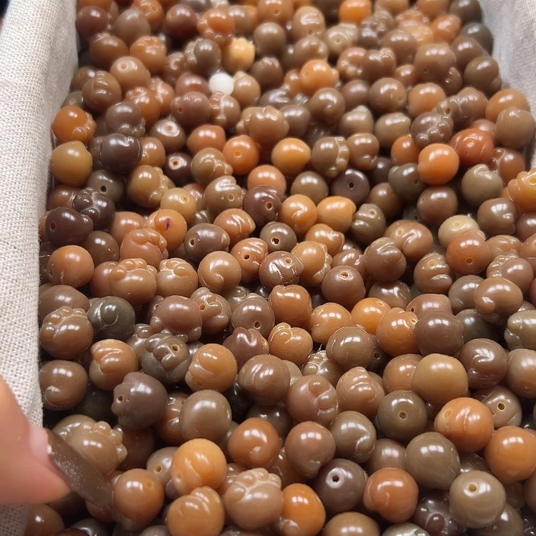 菩提根/象牙果手串微瑕老料冰咖猫爪50颗