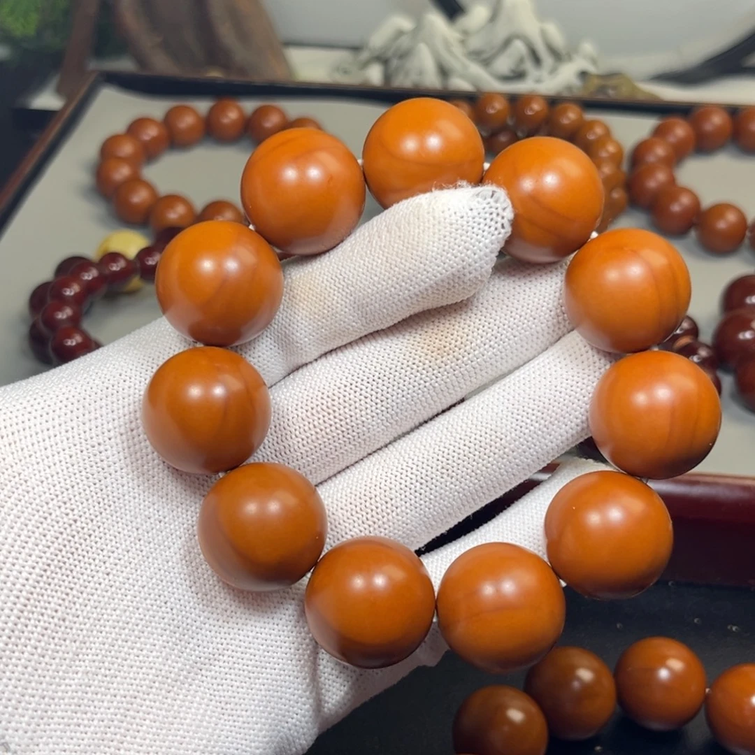 坦***然橄榄核吊坠2.1树王铁核精品