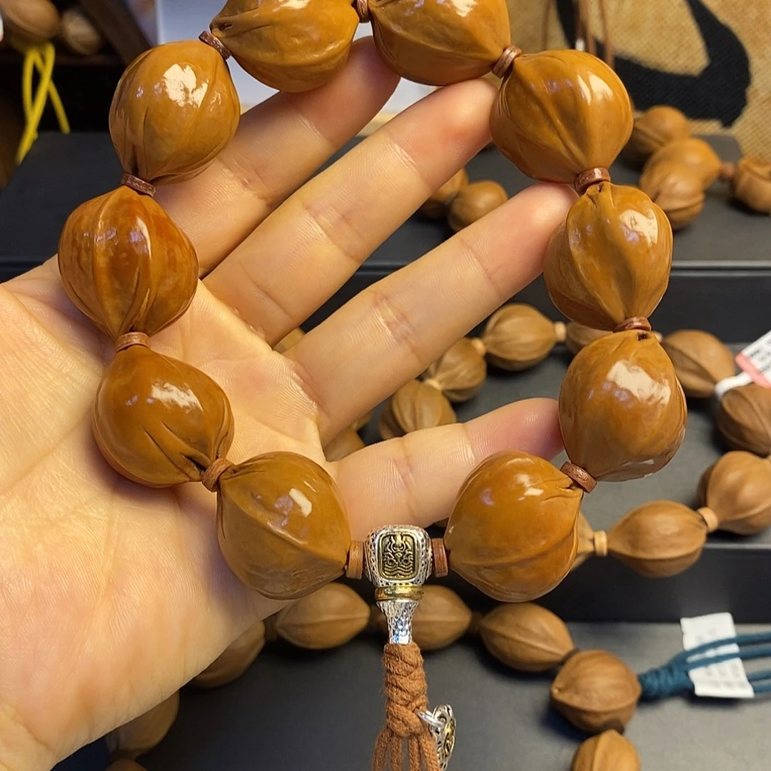 橄榄核手串/手链梅铁铁核24/27左右（四花）