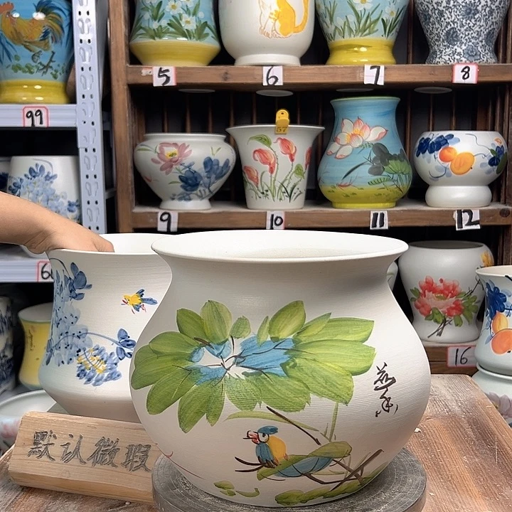 陶钱袋子荷花鸟新款新款陶瓷