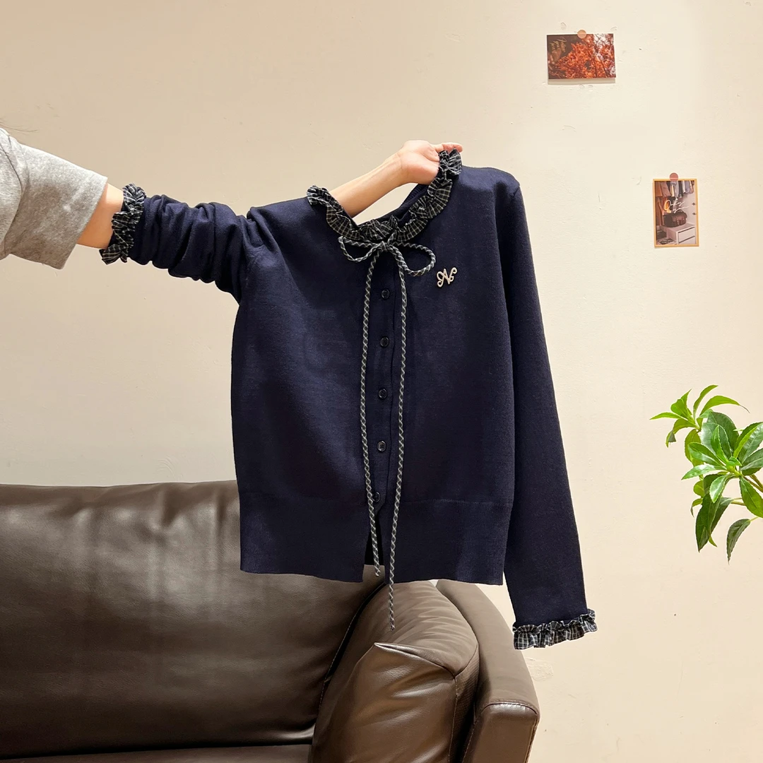 藏蓝学院风蝴蝶结木耳圆领针织衫女2025秋冬格子拼接百搭长袖上衣