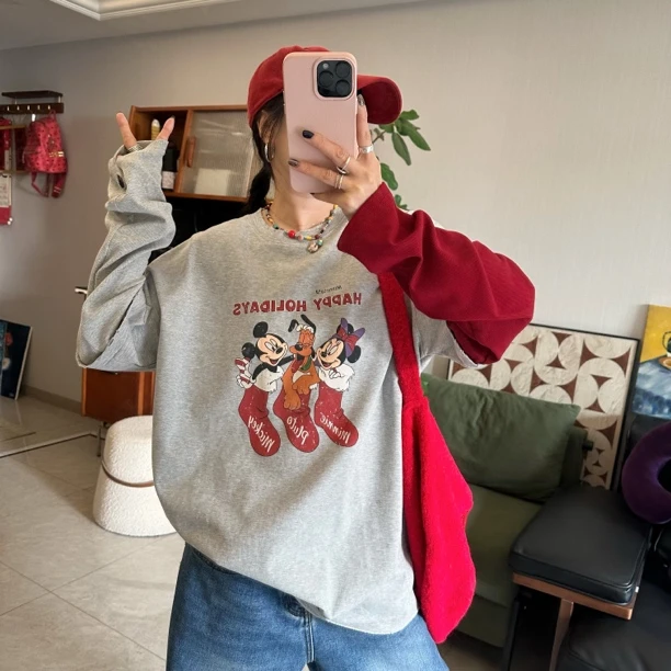 qiqi/琦琦推荐 韩版宽松高品质米奇图案印花拼接袖假两件套长袖T