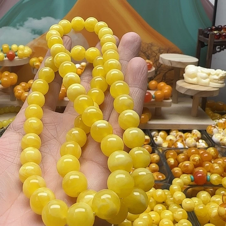 小***潘树脂非金属卡10鸡油黄项链一条