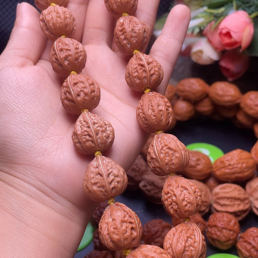 拼***搏文玩核桃手串雨滴