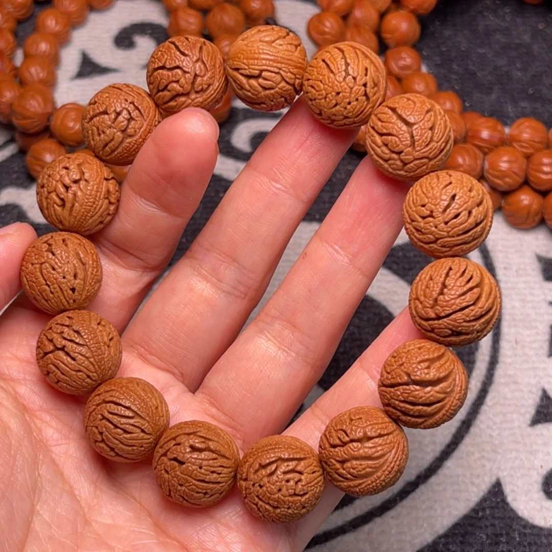 桃核手串龙纹绣球16