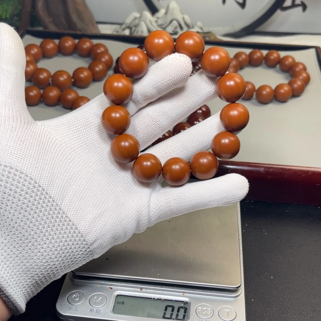 晨***光橄榄核吊坠1.7树王铁核精品