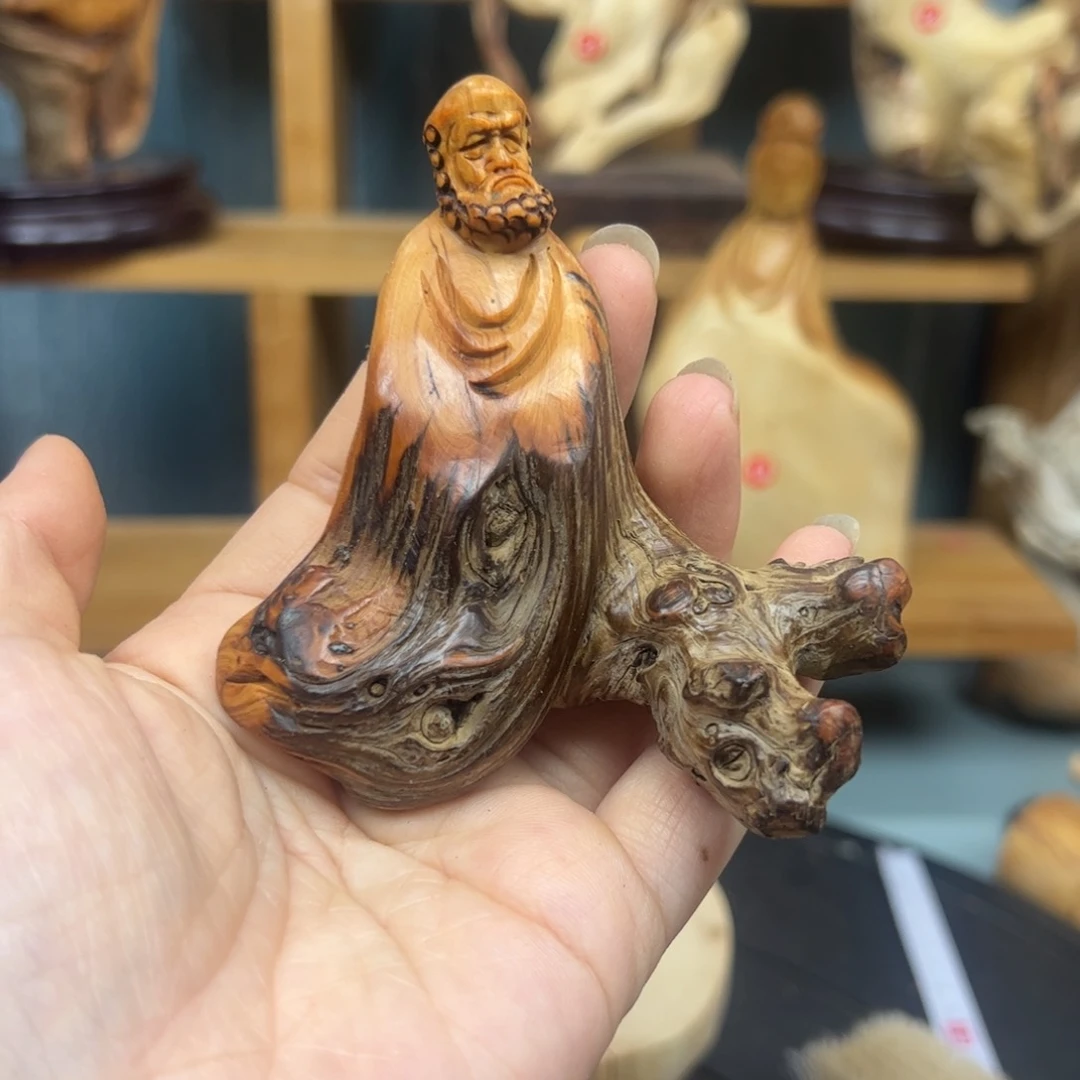 木德**业崖柏木摆件手把件