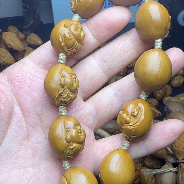 亮***了橄榄核雕刻手串米勒
