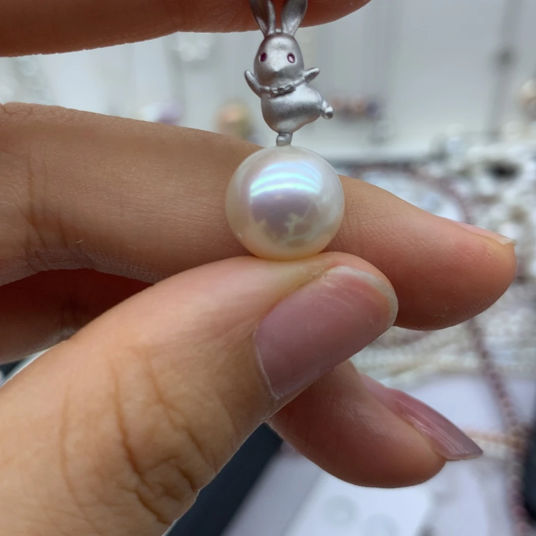 困***粉淡水珍珠银S925镶嵌颈饰