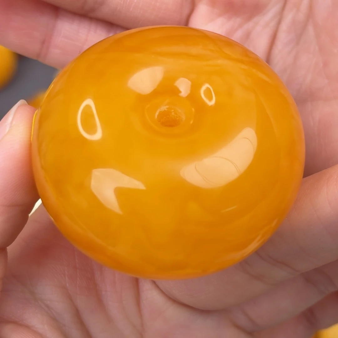 密***珊蜜蜡未镶嵌吊坠(不含链)橘红扣子