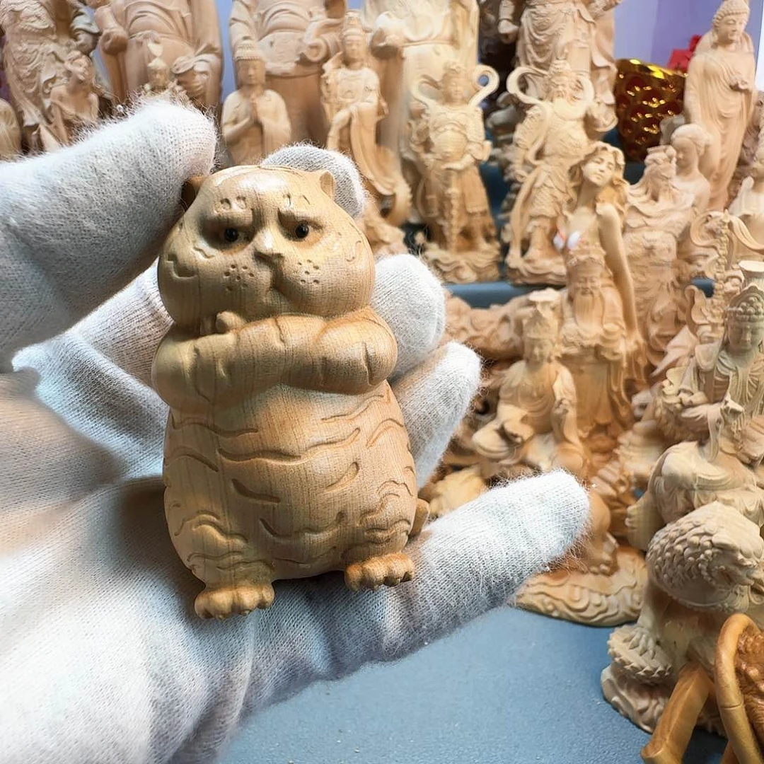 黄杨木我***你大叶黄杨木老虎手把件