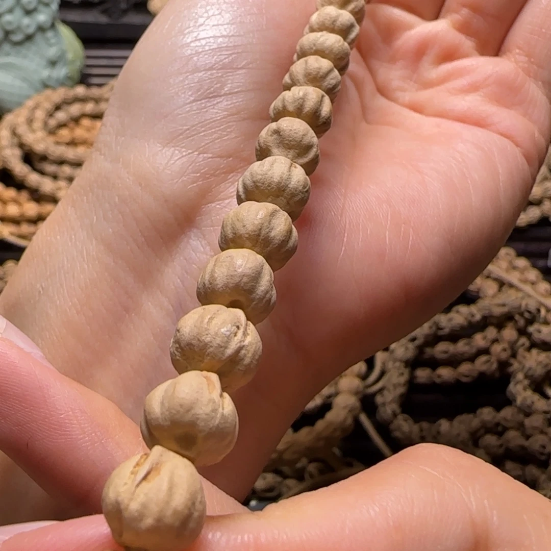 兰***面柏香籽/百香籽吊坠