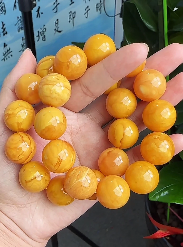 【齐福珠宝】XQ0401/19mm丹麦天然琥珀花蜡圆珠手串