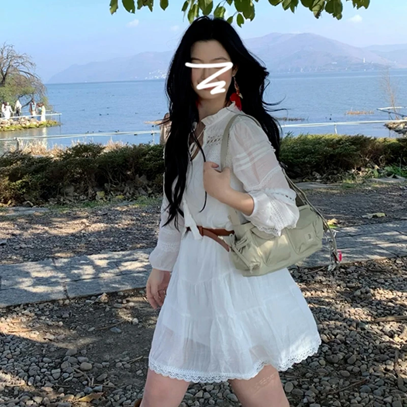 2025新款早秋度假风法式长袖白色连衣裙子女夏季云南新疆旅游穿搭