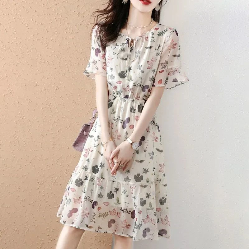 碎花连衣裙女2025夏季新款雪纺森系宽松显瘦短袖印花a字桔梗裙子