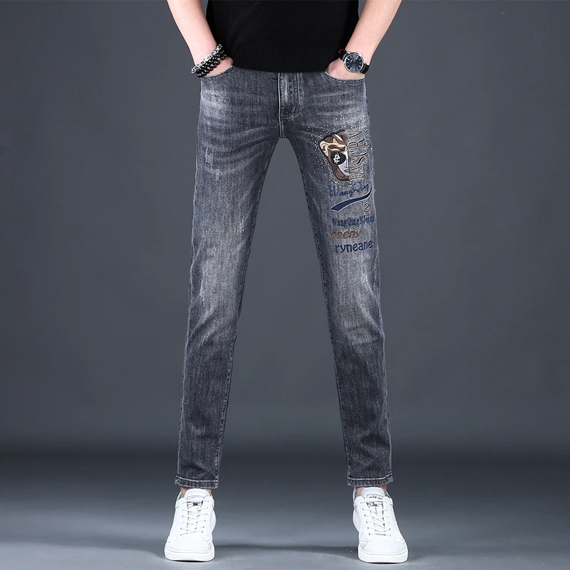 欧货男士时尚牛仔裤春季潮流修身小脚百搭刺绣男士弹力休闲潮流裤