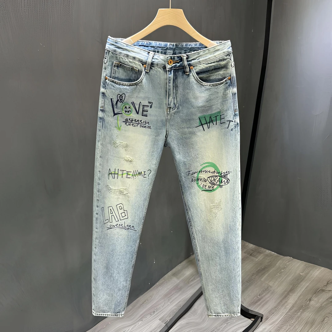 时尚感个性涂鸦印花男士牛仔裤夏季修身弹力水洗小脚裤舒适九分裤