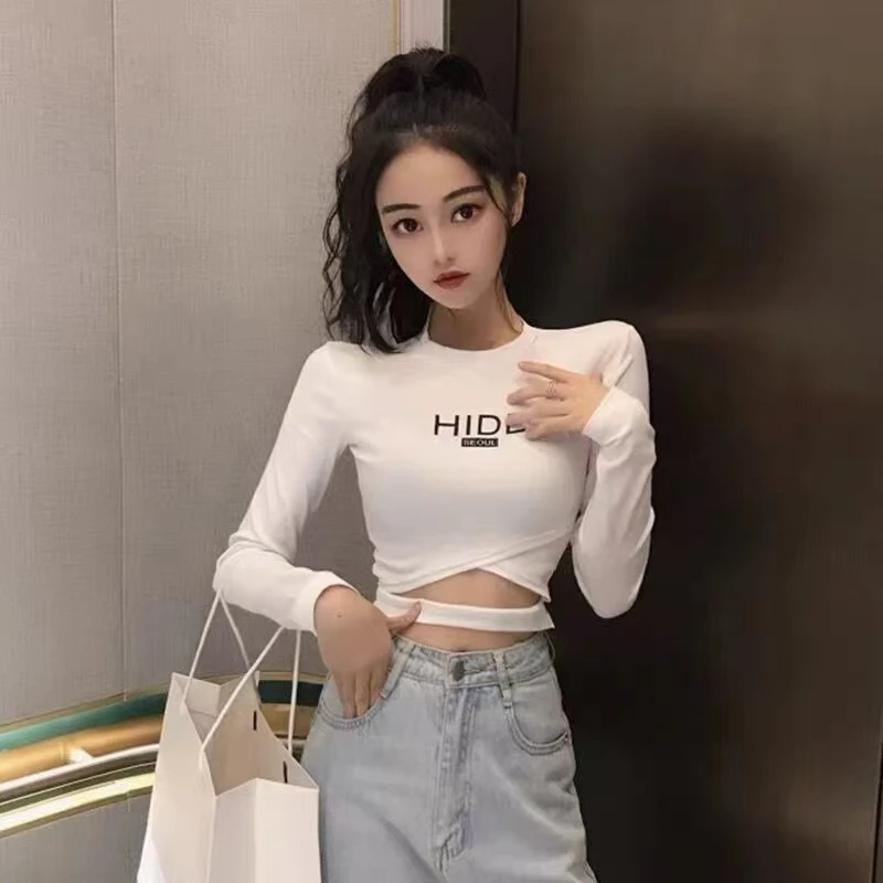 ins辣妹炸街短款露脐紧身印花长袖T恤女修身设计感交叉镂空上衣