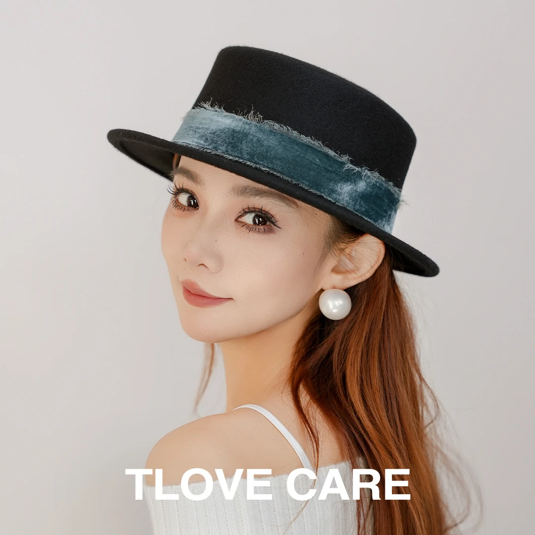 9568女士休闲高档时尚百搭经典毛呢秋冬平顶帽子