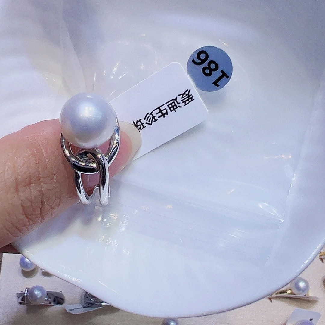 暖****淡水珍珠银S925镶嵌戒指