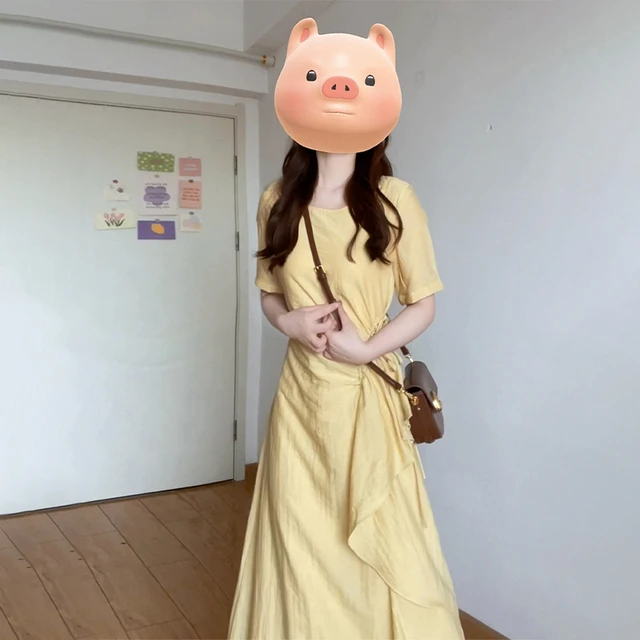 法式气质黄色连衣裙子女夏季2025新款设计感抽绳显瘦大方得体长裙