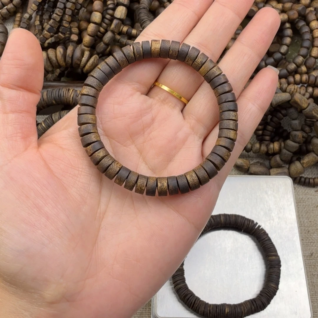 江***-沉香碎屑奇楠沉香0.8直切片珠