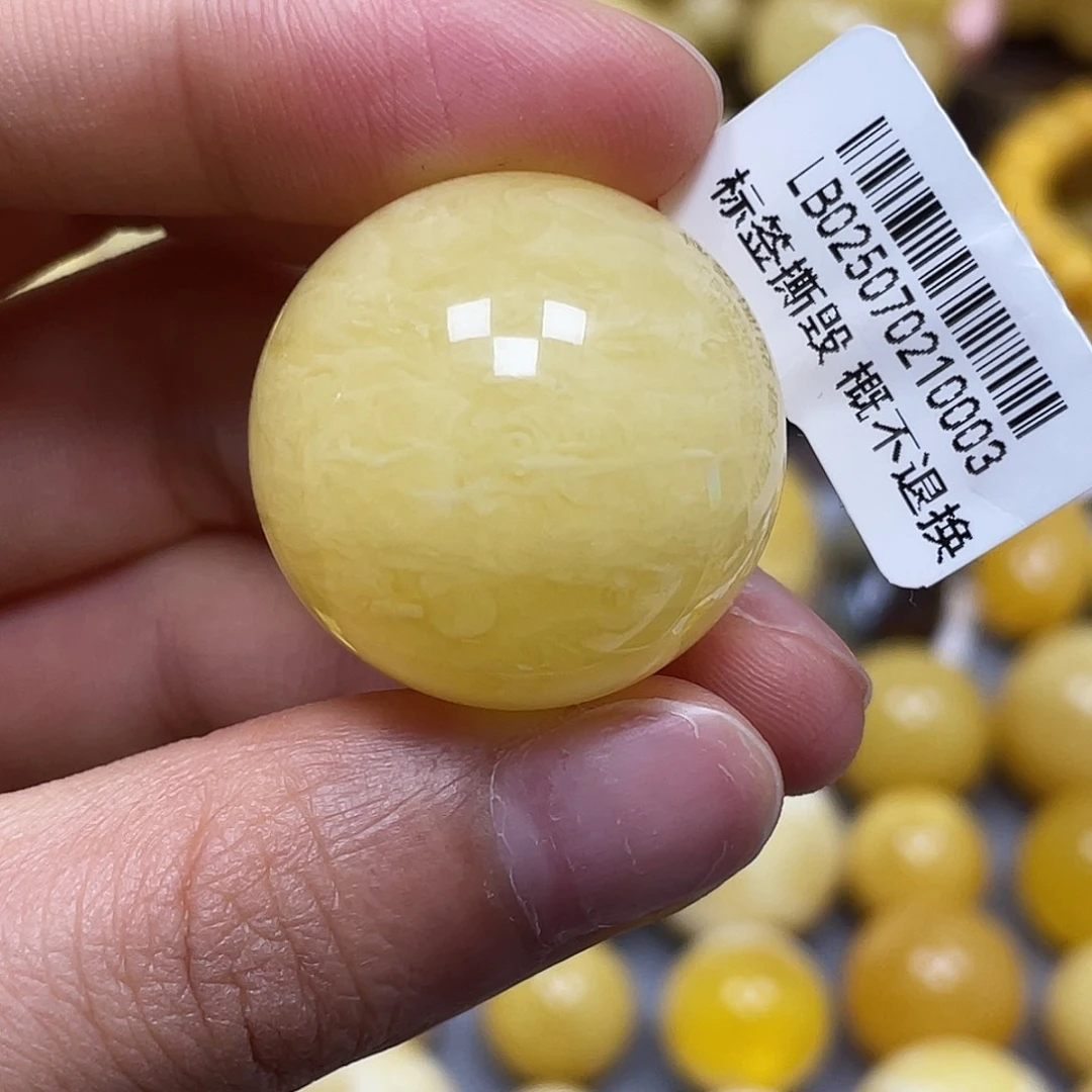 蜜蜡未镶嵌裸石26.6mm瑕