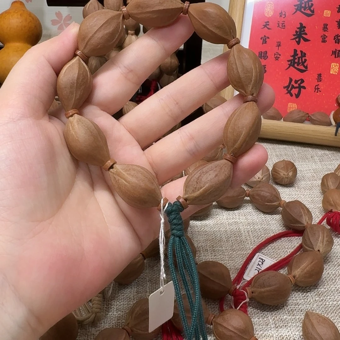 L***吊坠橄榄核梅林铁核1727