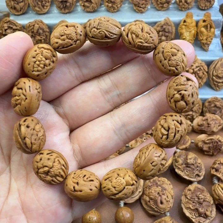 桃核吊坠阳**桃核雕刻材质