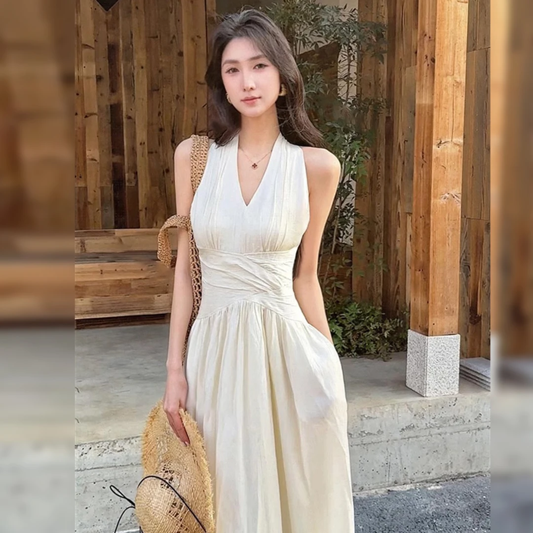 法式白色v领无袖挂脖吊带连衣裙子女夏季2025新款海边度假风长裙