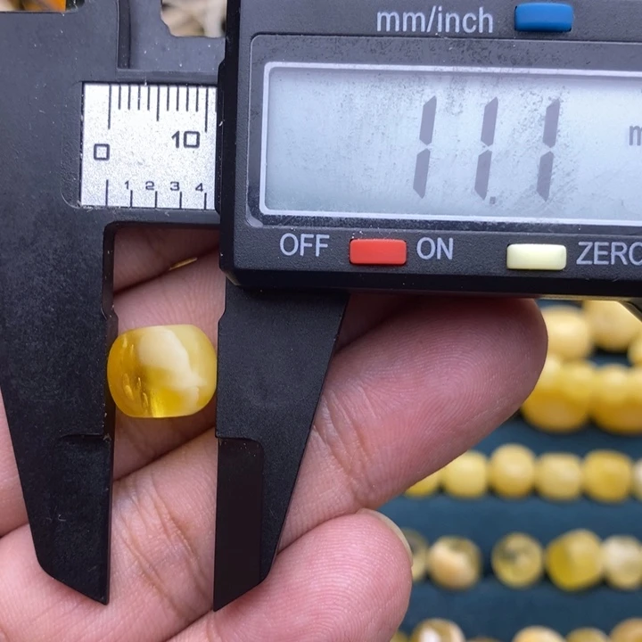 琥珀未镶嵌裸石35号11.1*9.3瑕