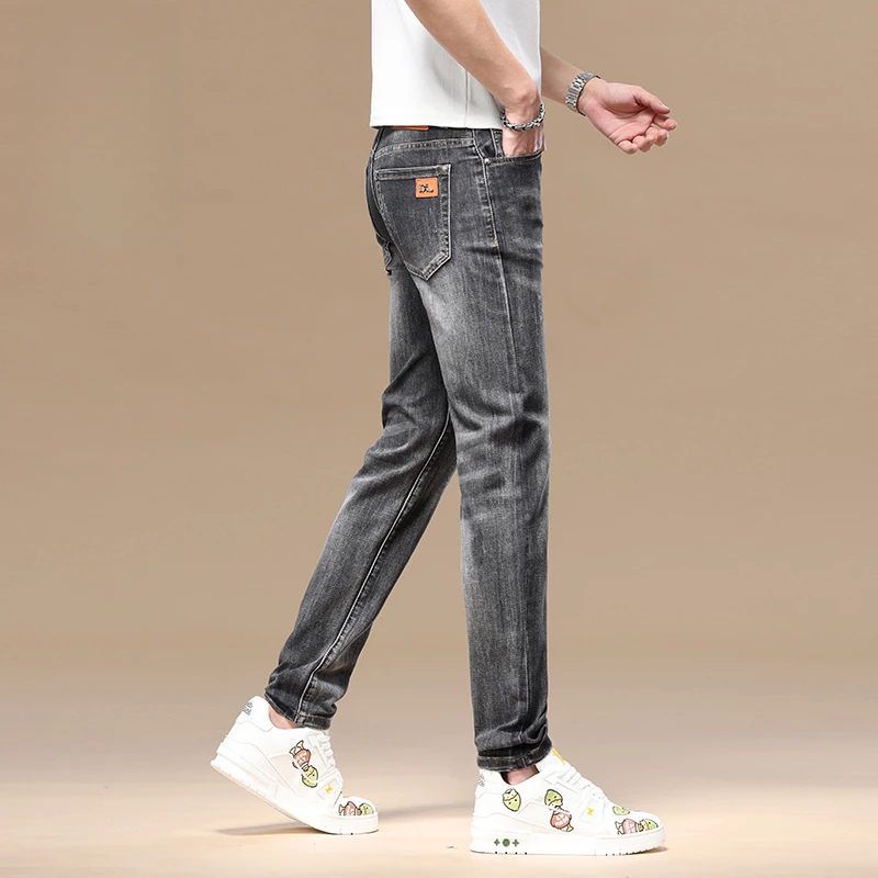 男士裤子新款烟灰色潮流高端修身小脚弹力牛仔裤时尚潮牌长裤男裤