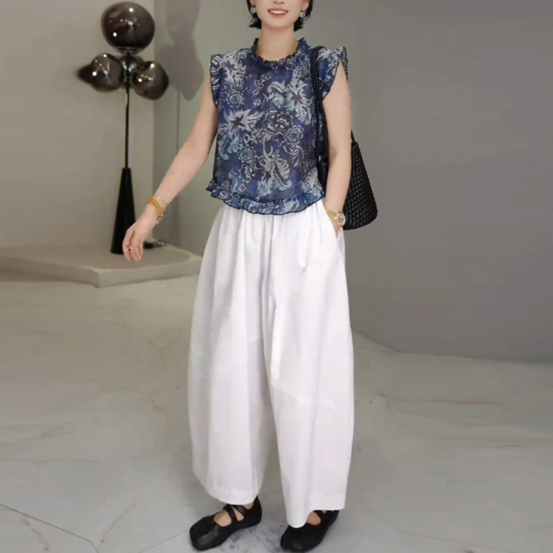 巨好看的夏装一整套女2025爆款时尚碎花无袖衬衫九分阔腿裤两件套