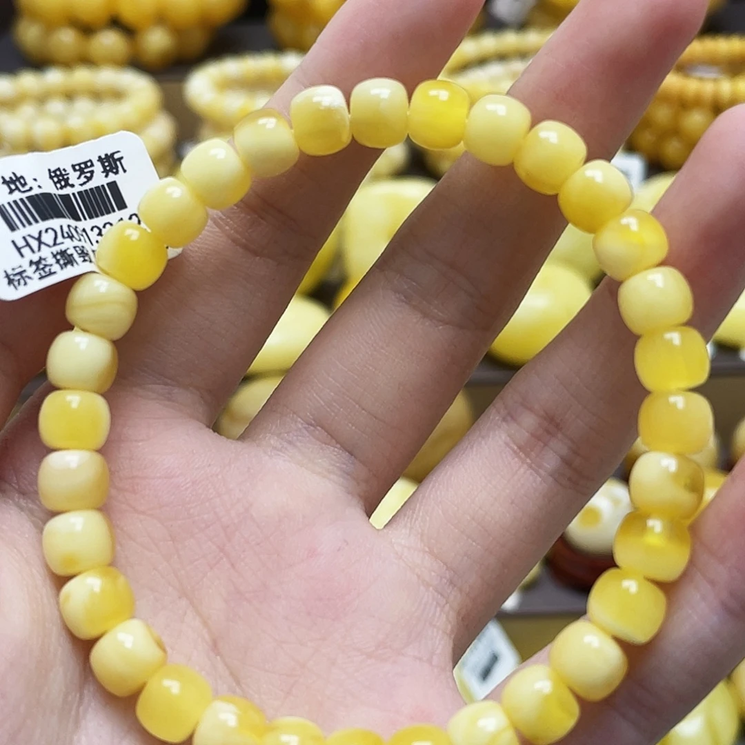 裸石琥珀未镶嵌7*5.7金妖溶洞老型手串瑕疵