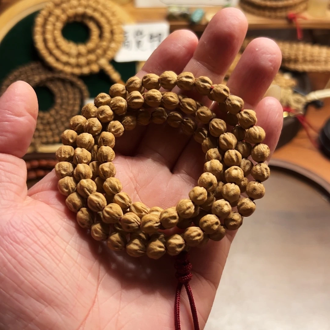 张***、吊坠柏香籽/百香籽郁金香莲花柏香籽