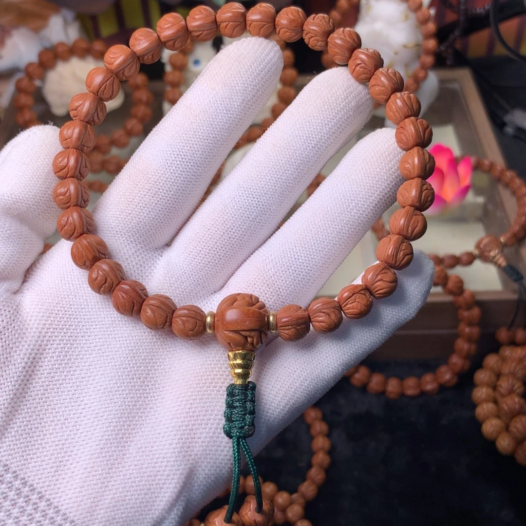 岗***上桃核吊坠玉龙脊手持09